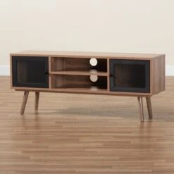 Yuna Natural Wood And Metal 2 Door TV Stand For TVs Up To 40" Brown/Black - Baxton Studio -Home Furniture Shop-Baxton Studio GUEST 3c3a84ad d6f8 448f 9fa2 52e7d18710f7