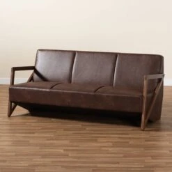 Christa Faux Leather Effect Fabric Upholstered Wood Sofa Dark Brown/Walnut Brown - Baxton Studio -Home Furniture Shop-Baxton Studio GUEST 742c2af8 1e2f 45c1 81c5 9803660511c3