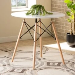 Varen Plastic And Wood Dining Table White/Oak Brown/Black - Baxton Studio -Home Furniture Shop-Baxton Studio GUEST c9bce4de 6311 494b 94b0 9c2da56f6287