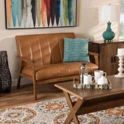 Nikko Mid-Century Faux Leather Upholstered Wood Loveseat Walnut/Brown - Baxton Studio -Home Furniture Shop-Baxton Studio GUEST d1496ae9 9e7b 4c99 a39c b224c1b080f8